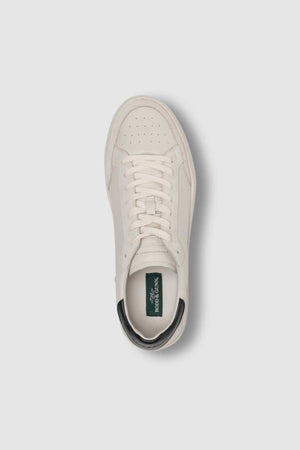Top view of the Rodd & Gunn Sussex Street Sneaker: single white leather-lined shoe with white laces, perforated toe area, dark green heel tab, logo on insole, and a durable rubber outsole.