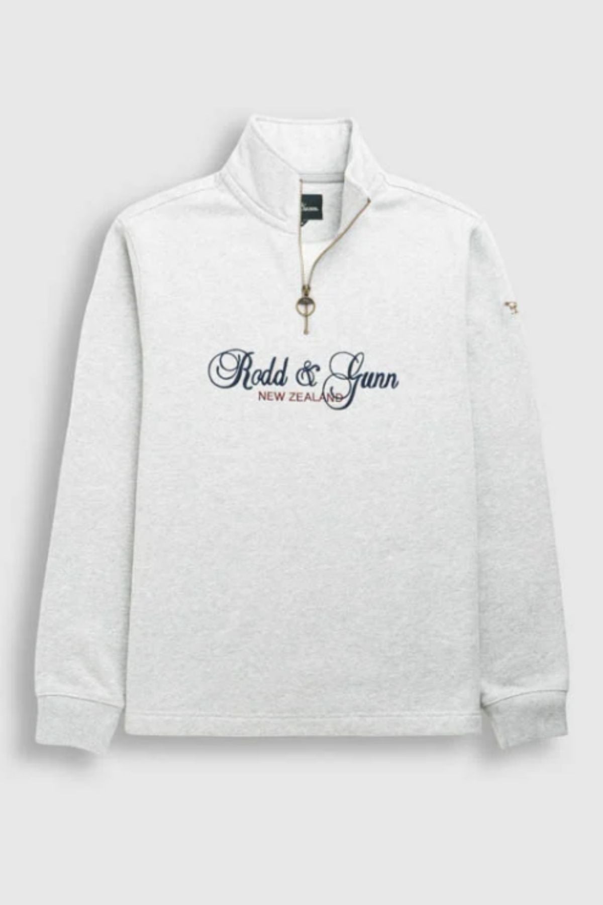 The Rodd & Gunn Jubilee Sweat is a light gray quarter-zip sweatshirt with "Rodd & Gunn New Zealand" embroidered in navy blue script. It features sustainable craftsmanship, a standing collar, and a zipper with an easy loop pull.