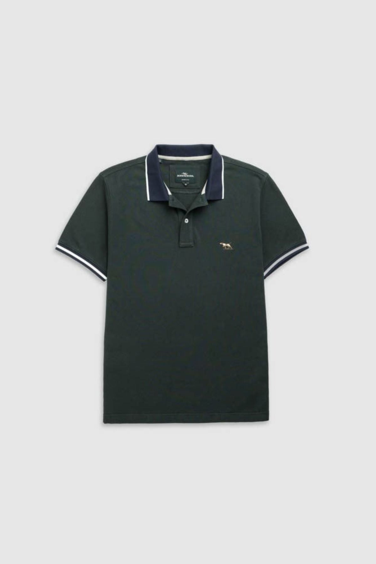 The Rodd & Gunn New Lynn Polo is a dark green men's sports-fit polo with a navy collar, white trim, and an embroidered left-chest logo. Made from Australian Good Earth Cotton for a sustainable choice.