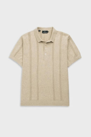 The Rodd & Gunn Brooklands Knit is a beige short-sleeve polo shirt crafted from soft Australian cotton, featuring a collar, three buttons, and subtle vertical textured stripes on the front, shown laid flat on a light background.