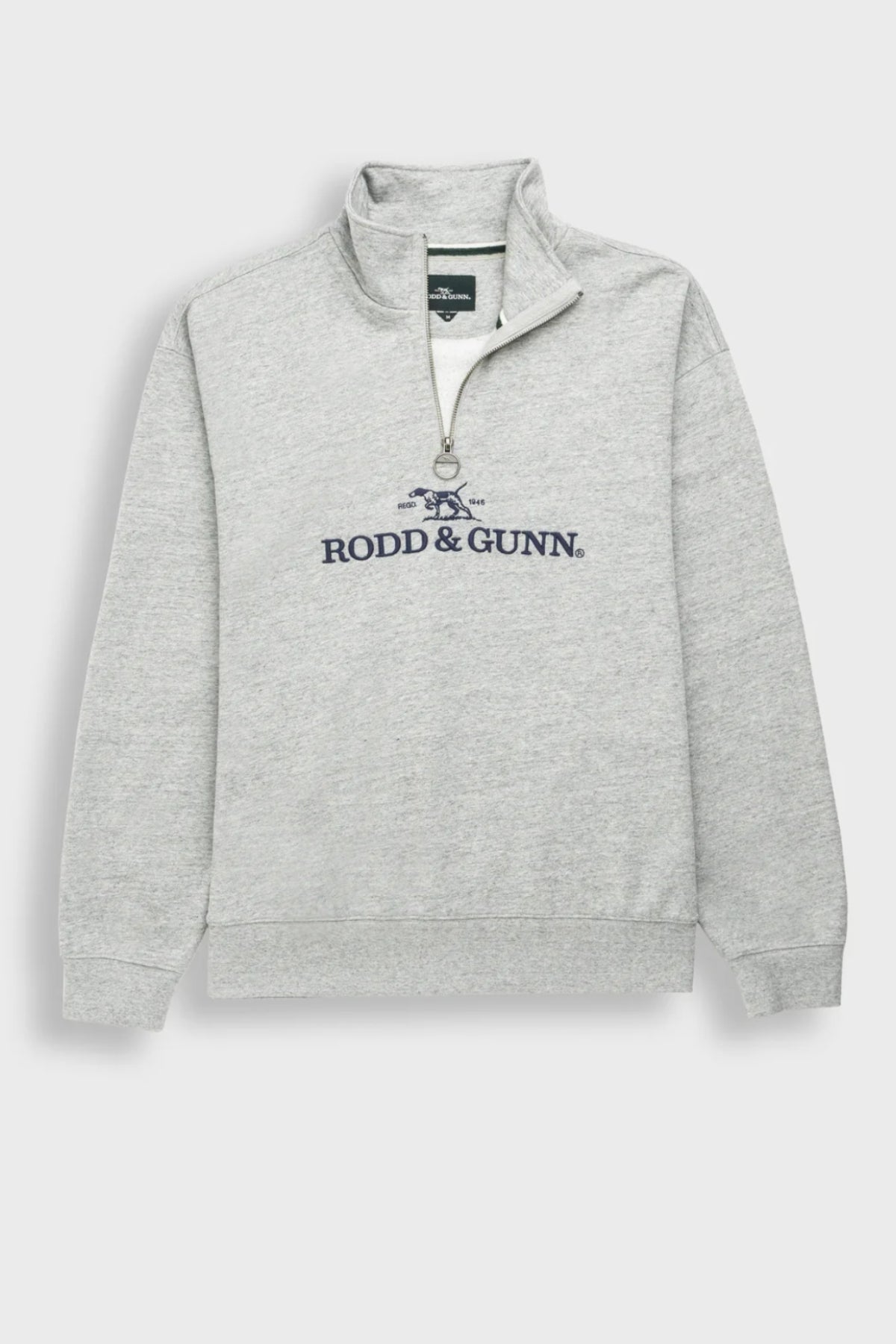 The Rodd & Gunn Milford Sound Sweat is a light grey quarter-zip sweatshirt with a premium YKK metal zip, stand-up collar, long sleeves, ribbed cuffs and hem, and “RODD & GUNN” logo embroidered in dark blue.
