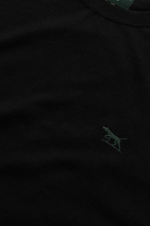 Close-up of the Rodd & Gunn The Gunn Tee 2.0, a black sports fit t-shirt made from 100% cotton, featuring a small dark green embroidered walking leopard logo on the left chest.