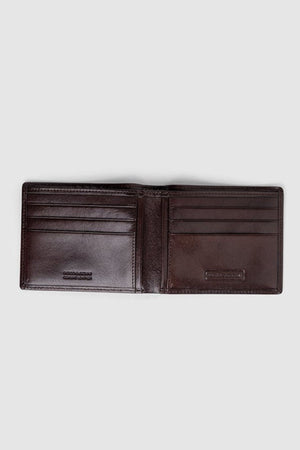 The Rodd & Gunn Wakefield Bi-Fold Wallet, crafted from dark brown Italian leather, is open to reveal multiple card slots on both sides against a light gray background.