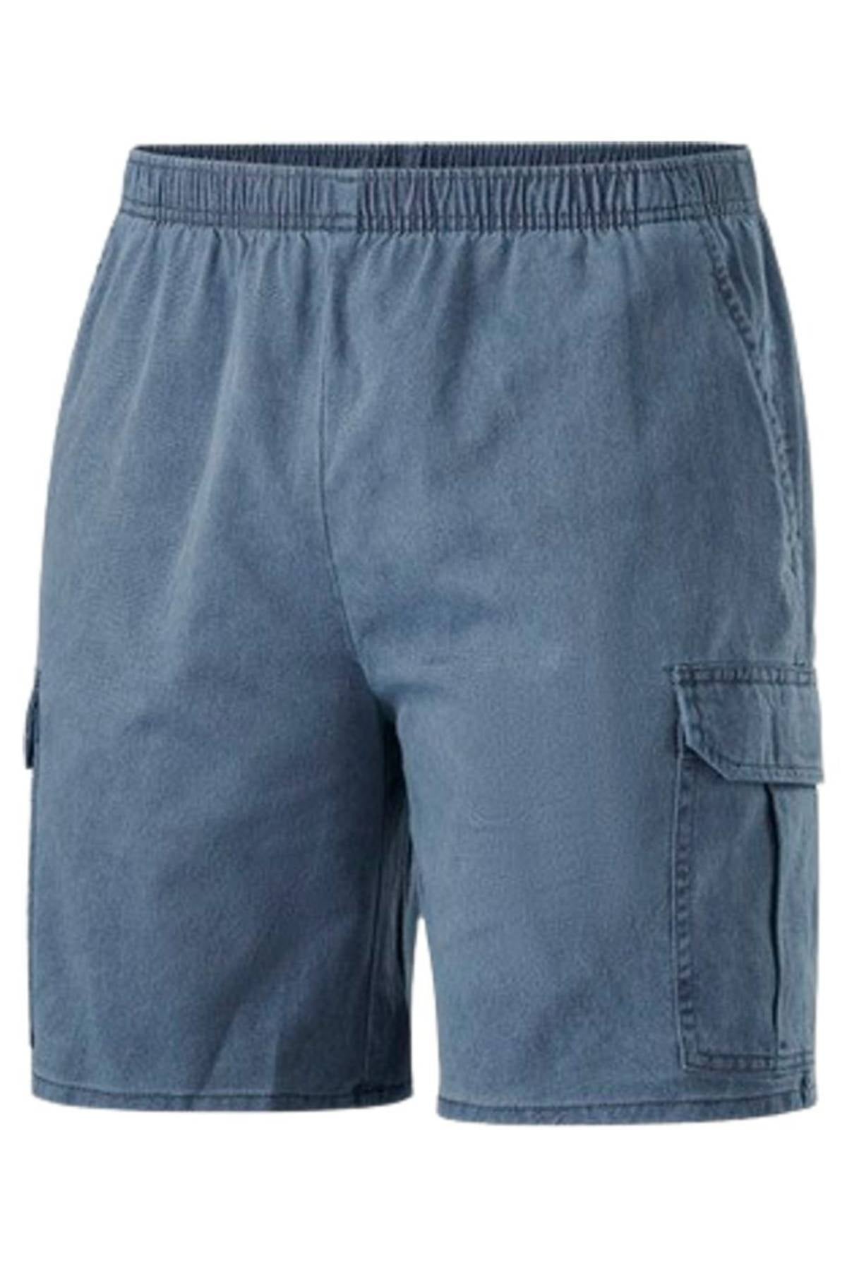 The Ruggers Pigment Cargo Short in blue denim features an elastic waistband, side pockets, and a large right leg flap pocket—ideal for outdoor activities. Shown on a plain white background.
