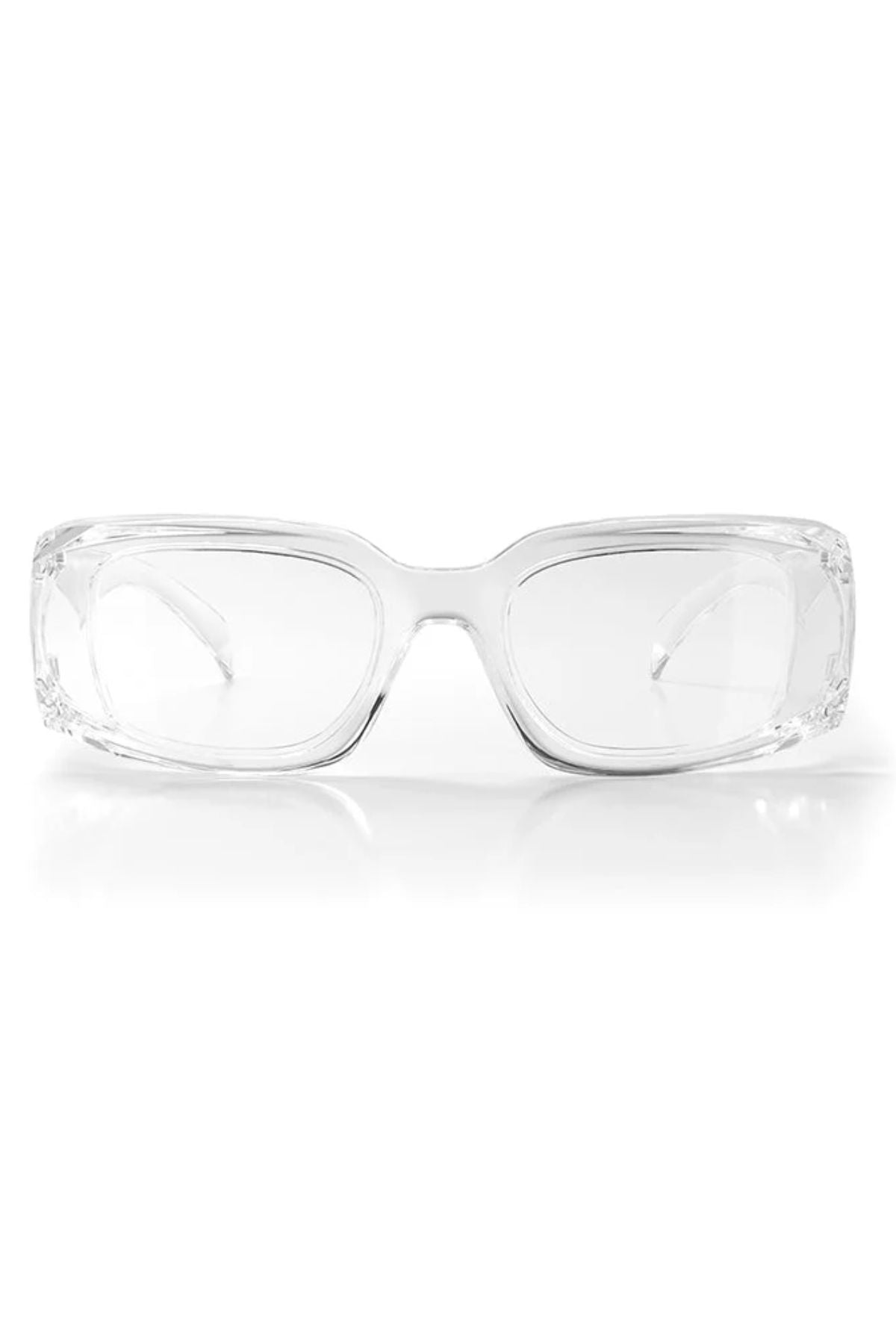 The SafeStyle Auras Clear Frame Clear Lens features thick, transparent rectangular frames and shatterproof polycarbonate UV400 lenses, displayed front-facing on a white background.
