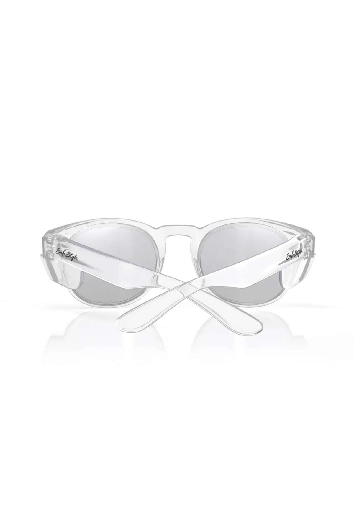 The SafeStyle Cruisers Clear Frame Hybrids feature photochromic lenses and UV400 protection. Displayed with crossed arms on a white background, the brand name appears in script on both temples.