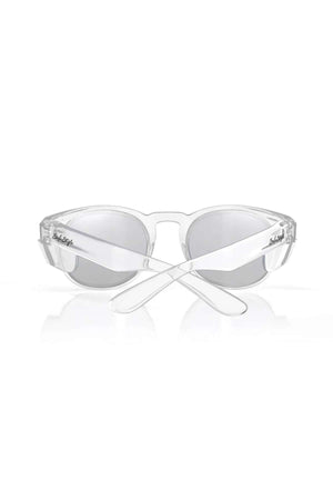 The SafeStyle Cruisers Clear Frame Hybrids feature photochromic lenses and UV400 protection. Displayed with crossed arms on a white background, the brand name appears in script on both temples.