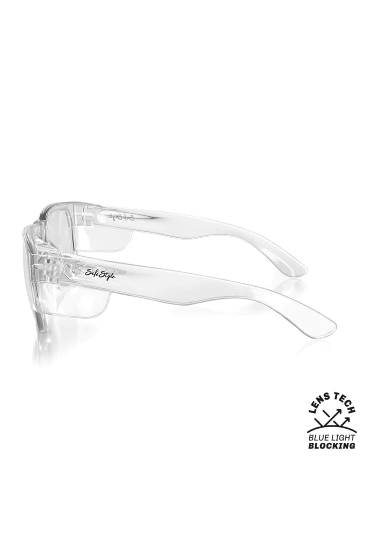 SafeStyle Fusions Clear Frame Blue Light Lens eyeglasses feature transparent polycarbonate frames and arms, shown in a side view with "Subscribe" on the frame. An icon highlights their blue light lens technology for eye protection.