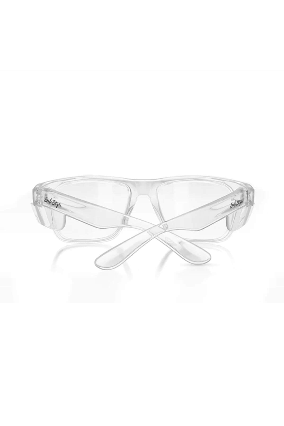 SafeStyle Fusions Clear Frame Blue Light Lens safety glasses feature wraparound polycarbonate frames, side protection, and crossed arms in a front view.