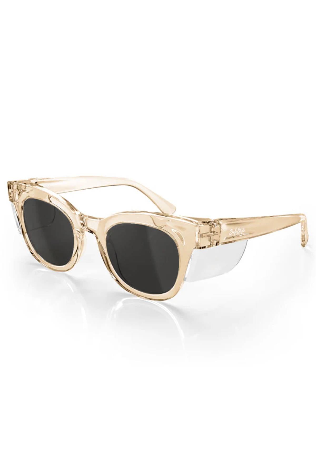 The SafeStyle Harps sunglasses feature a stylish champagne frame with dark, polarised lenses, decorative side shields, and UV protection.