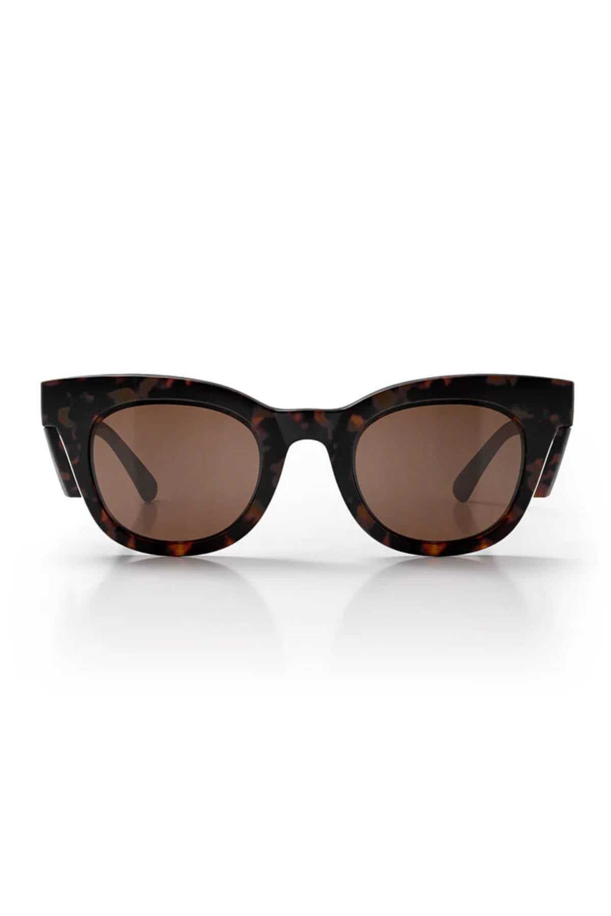 Front view of SafeStyle Harps sunglasses with a matte tort frame and brown polarised lenses offering UV protection, shown against a white background with a subtle reflection below.