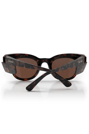 SafeStyle Harps Matte Tort sunglasses with brown polarised lenses, shown from the back with thick arms crossed and "Soleil S." branding—offering UV protection for your eyes.