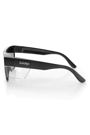 SafeStyle Primes Black Frame Tinted Lens safety glasses shown from the side on a white background, featuring a durable frame, tinted lenses, thick side arms, and the white "SafeStyle" logo.