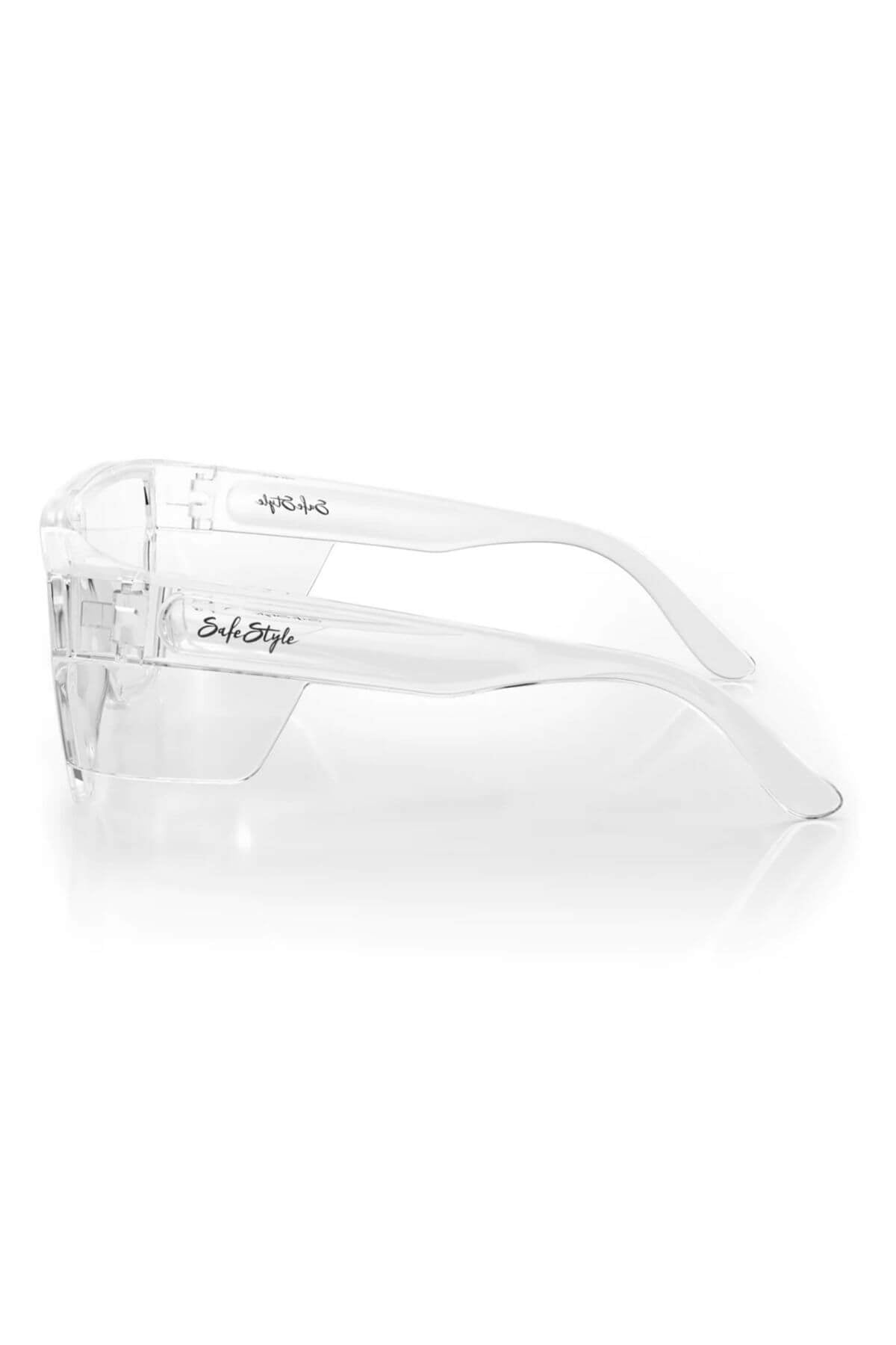 SafeStyle Primes Clear Frame Clear Lens safety glasses feature wraparound UV400 lenses and transparent frames. "SafeStyle" and "AS/NZS 1337.1" are printed in black on the arms, shown from a side view.