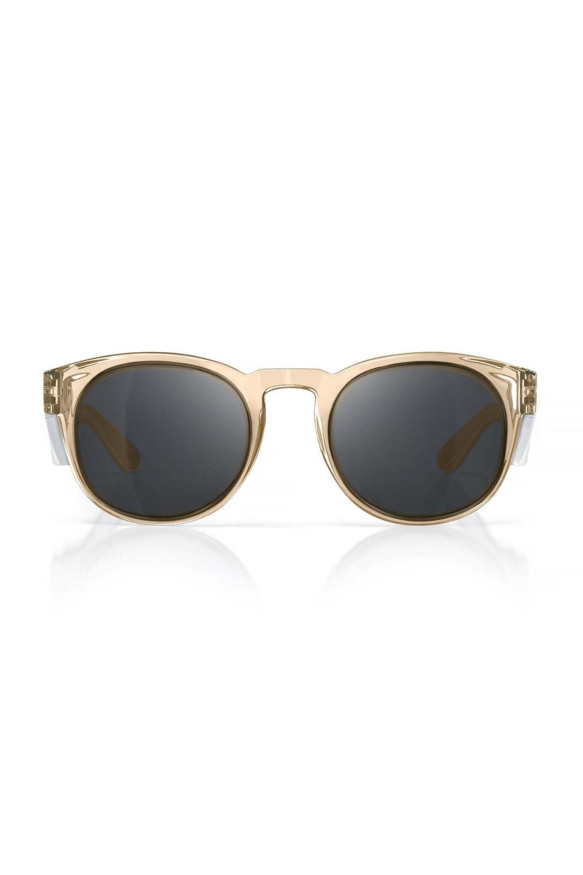 Front view of SafeStyle Cruisers with a champagne frame and tinted polycarbonate lenses offering UV400 protection, resting on a white surface with a subtle reflection below.