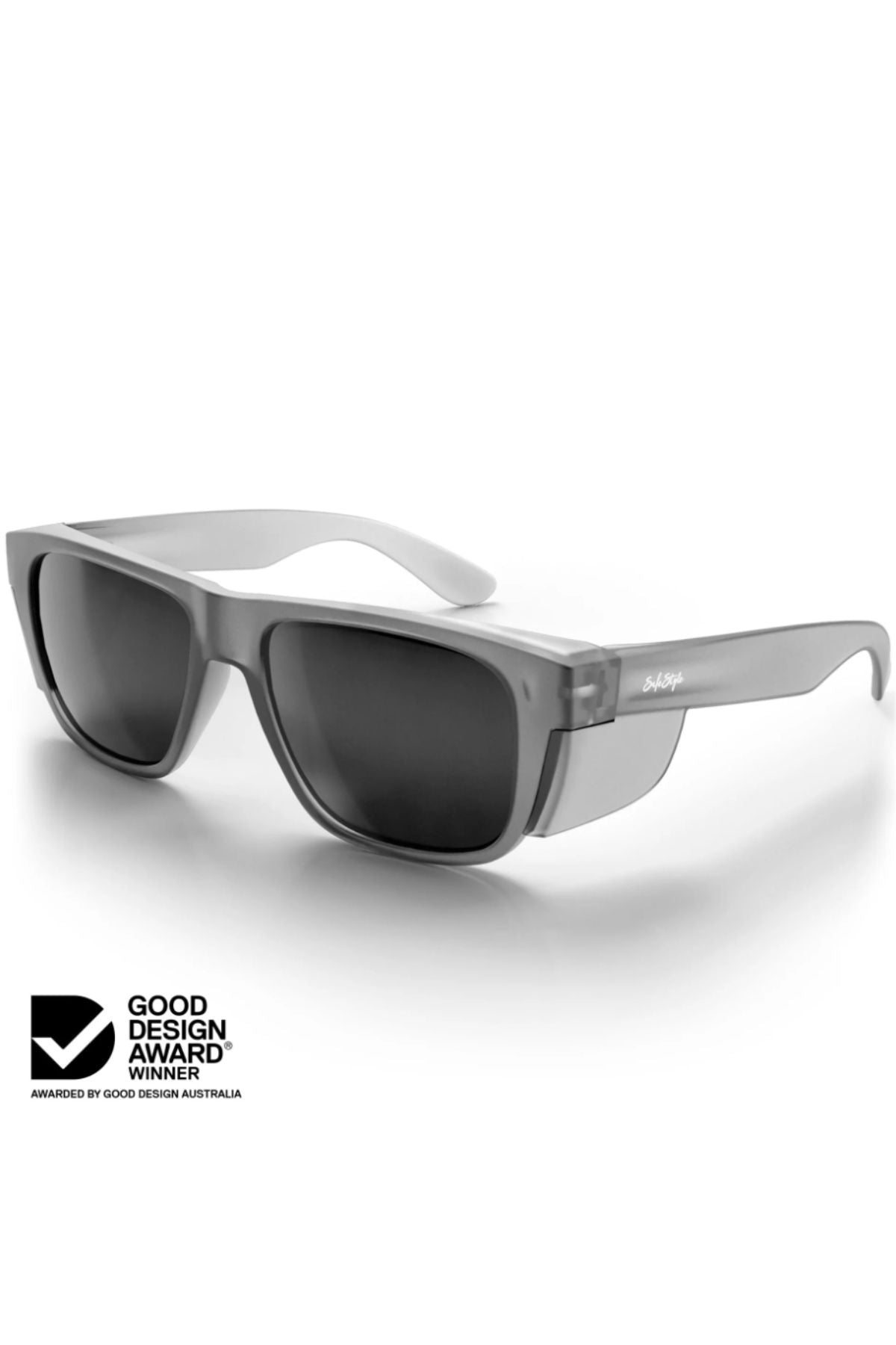The Safestyle Fusions XL sunglasses feature a stylish, rectangular matte graphite frame with thick edges and polarised lenses for UV protection. The Good Design Award Winner logo is in the lower left corner on a plain white background.