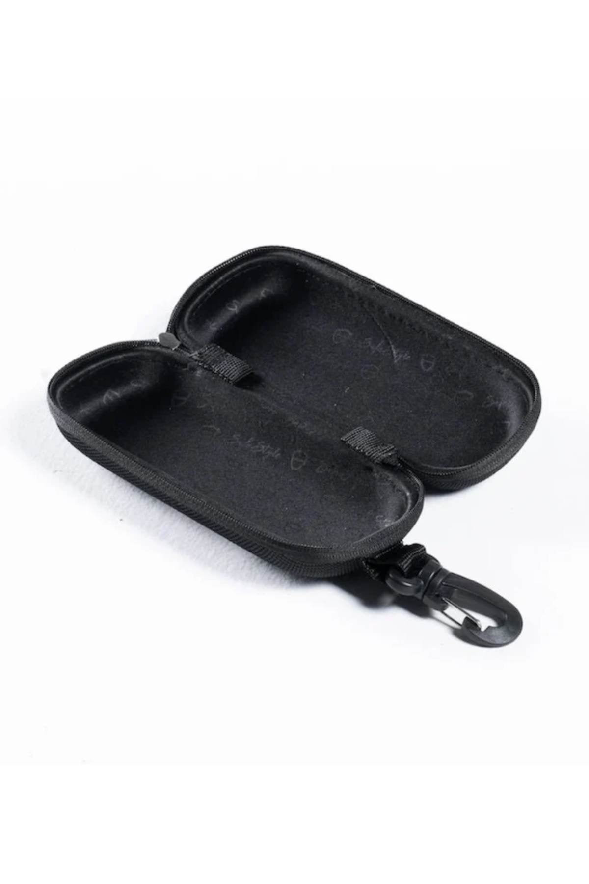 The Safestyle Hardcase is a small, black, hard-shell sunglasses case made from durable nylon. Its open design reveals an empty, soft interior, and a clip is attached for easy carrying.