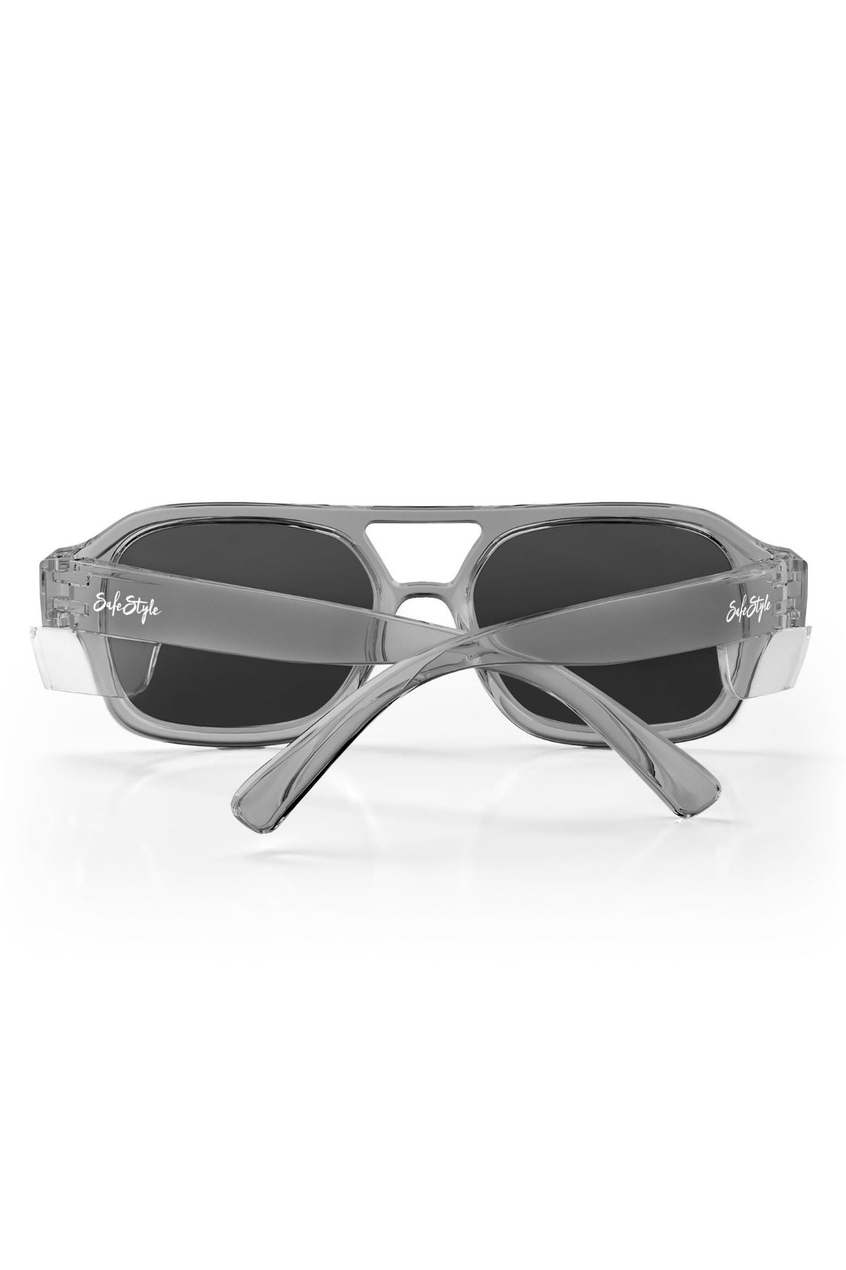 The Safestyle Skylines sunglasses feature a stylish rectangular vintage-inspired graphite frame with grey polarised lenses and crossed arms. “Salt Style” is printed in white on both arms. These UV400 sunglasses are displayed on a white background.