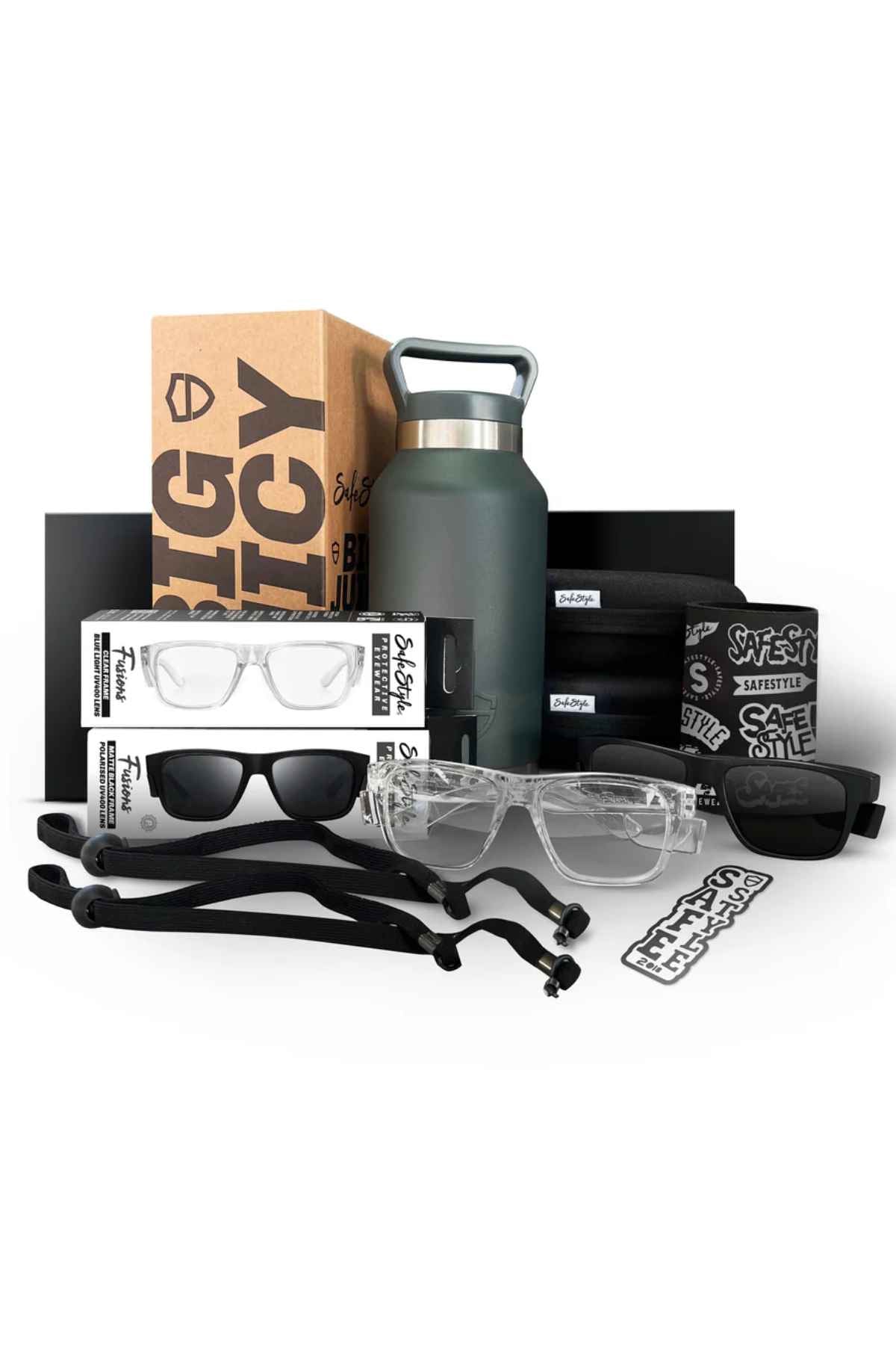 The Safestyle Worksite to Weekend Legends Box is expertly curated, showcasing clear safety glasses with polarized lenses, dark sunglasses, eyewear straps, a grey water bottle, safety stickers, and branded packaging.