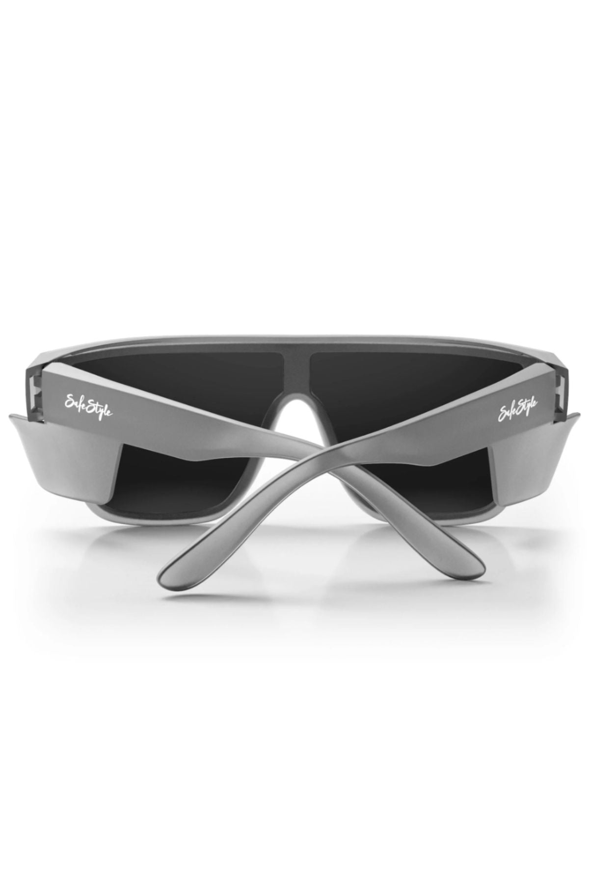 The Safestyle Primes Matte Graphite Frame Polarised Lens sunglasses are shown from the back with crossed arms. They feature shatterproof, UV400 protection and have “So In Style” printed in white on both arms near the hinges.
