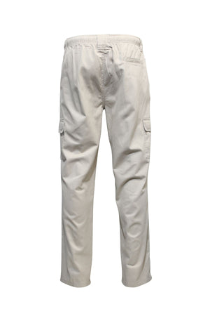 Savane Panama Beach Cargo Pant in beige, shown from the back on a white background, features an elastic waistband, side flap pockets, and a discreet security pocket.