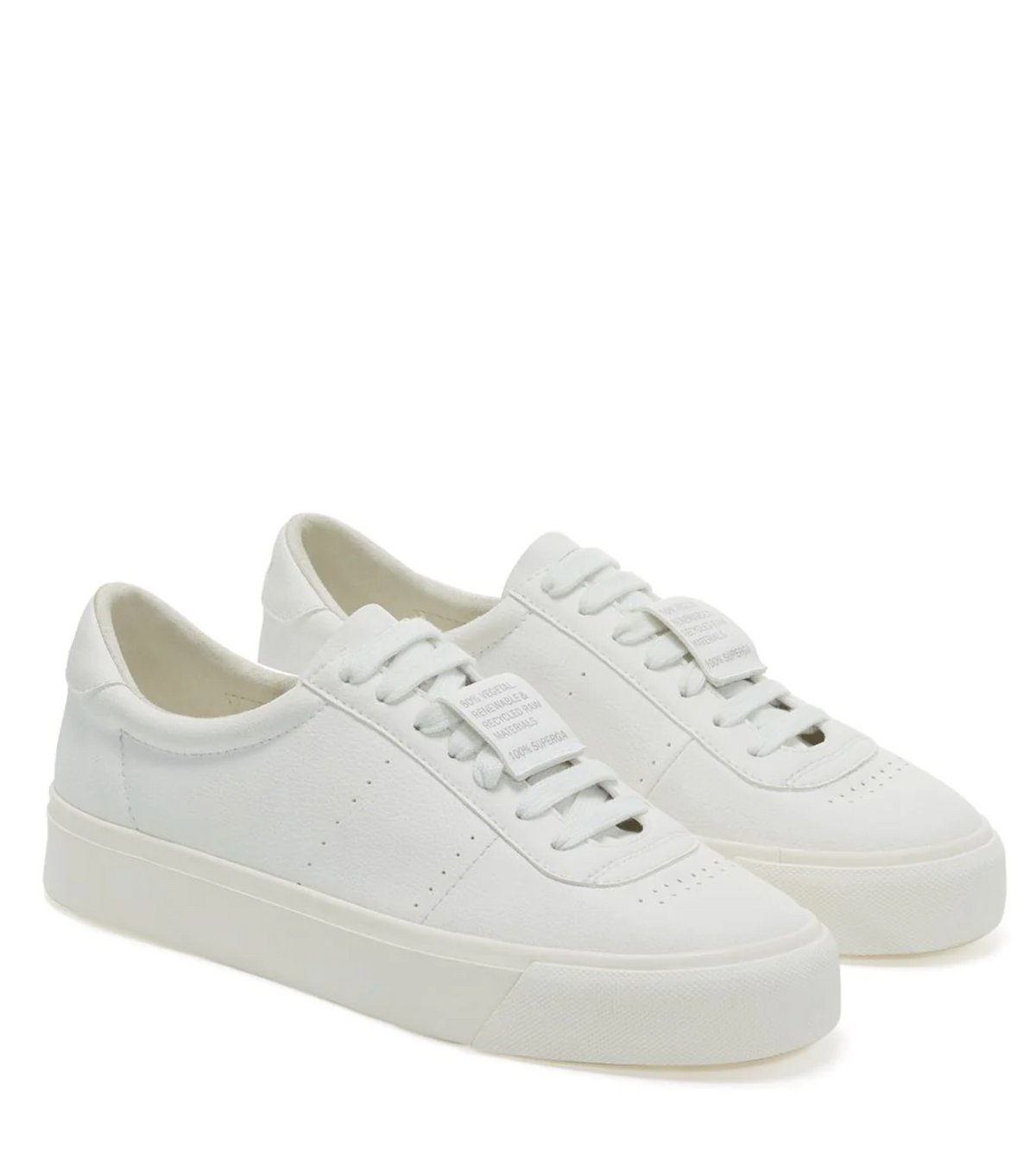 The Superga 4834 Club S sneakers feature a minimalist design with grape-based faux leather, laces, and a smooth upper. They sit on a chunky vulcanized rubber sole, with the brand tag angled slightly to the right on the tongue.