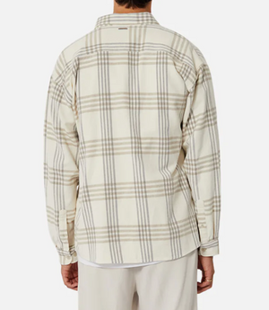 A person is seen from the back wearing the Industrie The Danville Shirt—a stylish, regular fit cream plaid shirt with light gray and beige stripes in 100% cotton—paired with light pants against a plain white background.
