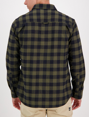 A person shown from the back wears the Swanndri Taranaki Tailor Shirt in green and black plaid (100% cotton, tailored fit, long sleeves) with beige pants against a plain white background.