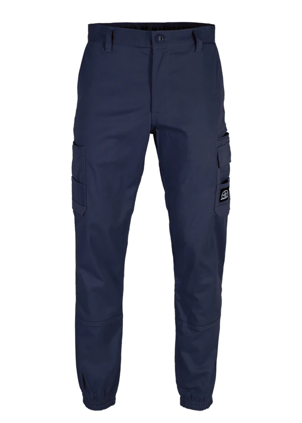 The UNIT Demolition Cargo Cuffed Pant is made from durable, stretchy dark blue fabric with multiple cargo pockets, an elastic waistband and cuffs. It features UPF 50+ and a small logo patch on the upper side pocket for added style.