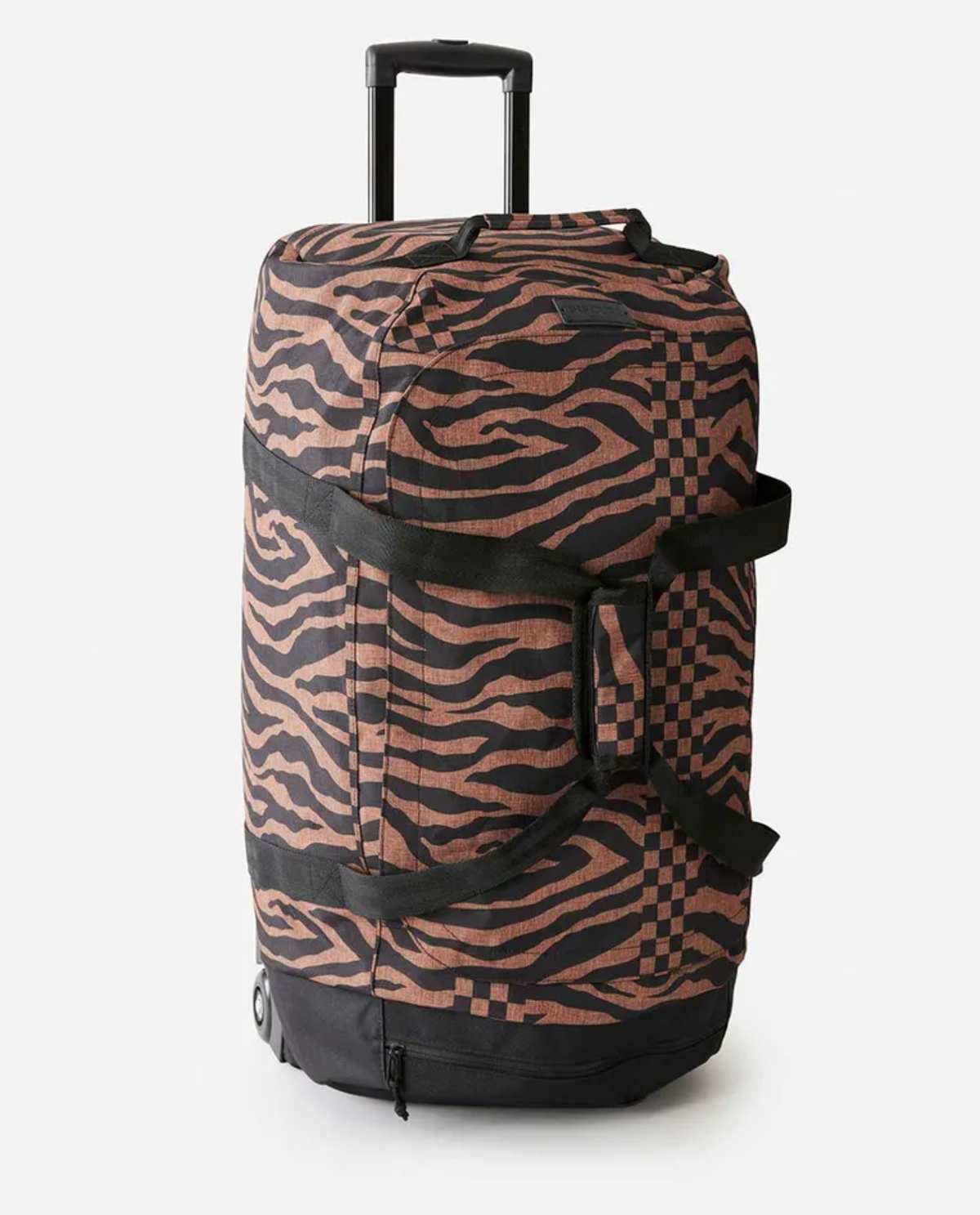 The Rip Curl Jupiter 80L Travel Bag is a large water-resistant rolling duffle with a brown and black tiger stripe and checkerboard pattern, black straps, two wheels, and a black extendable handle.