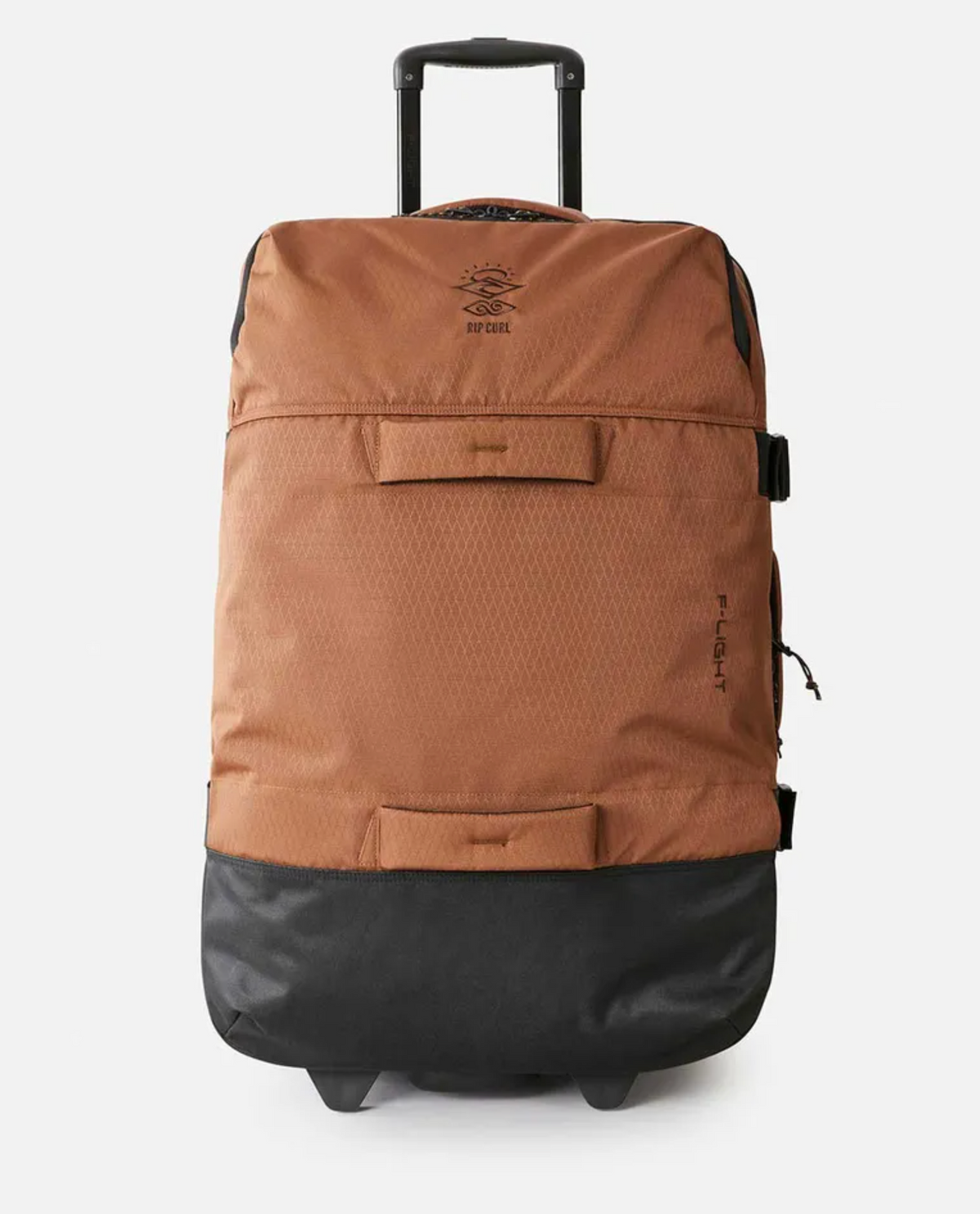 The Rip Curl F-Light Global 110L Searchers Travel Bag, in brown and black with a retractable handle, inline skate wheels, and a zippered front pocket, made from durable recycled CORDURA polyester, stands upright on a plain white background.