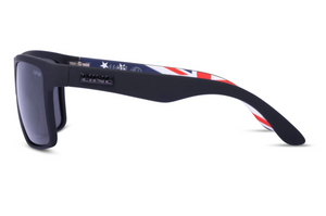 Liive Hoy 4 Polar Oz Sunglasses feature thick black frames and inner arms with a red, white, and blue stars and stripes pattern. "LINE" branding is on the outer arm near the hinge. Includes UV protection for your eyes.