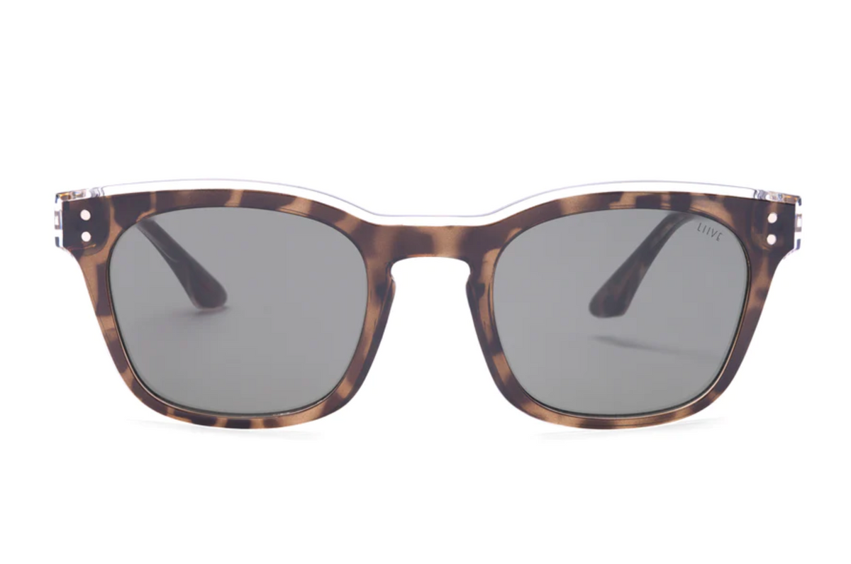 The Liive Morgan Sunglasses feature tortoiseshell, rectangular wayfarer frames with dark lenses providing UV protection, elegantly displayed against a white background.