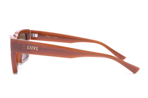 Side view of Liive Oney Sunglasses featuring translucent brown polycarbonate frames with thick arms and "LIIVE" in white and gold, designed for reliable UV protection.