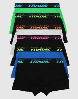 The Tradie Mens 6PK Trunk offers a comfortable fit with six boxer briefs, each featuring "TRADIE" on the waistband in vibrant colors like green, orange, blue, pink, and yellow against a black band. Made from cotton elastane for flexibility, available in black, gray, and blue.
