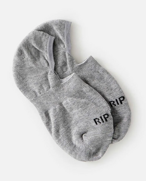 A pair of gray Rip Curl Women's Invisible Socks displays dark "RIP" lettering on the toes, set against a plain white background, featuring an inner heel silicon grip and slightly overlapping.