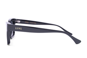 Side view of black Liive Dan Polar sunglasses with "LIIIVE" in gold on the arm. Crafted with polycarbonate lenses, these sunglasses boast a sleek, glossy finish and slightly curved arms for both style and UV protection.