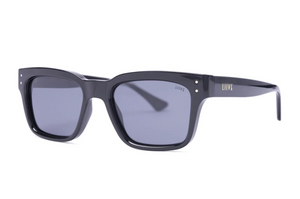 Liive Dan Polar Sunglasses are rectangular, black with dark lenses and a glossy polycarbonate finish. The durable frame includes UV protection, subtle metal accents near the hinges, and a small brand logo on the side of the arms.