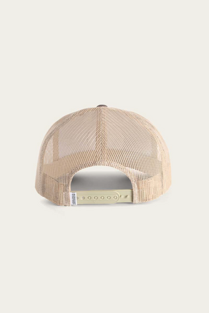 The Ringers Western Signature Bull Trucker Cap is shown from the back in beige, featuring a mesh back, plastic snap closure, and a small white tag on the left side against a plain light background.