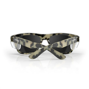The SafeStyle Fusions sunglasses have a Milky Tort frame with the brand logo on the arms and dark, polarized lenses for UV protection. The crossed arms showcase their unique style against a plain white background.