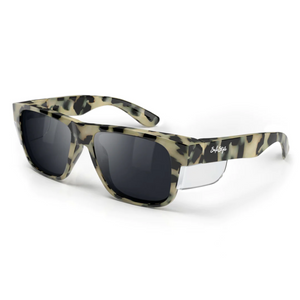 The SafeStyle Fusions sunglasses have a Milky Tort frame with polarized lenses, featuring side shields for added eye protection. They deliver excellent UV protection while meeting high safety standards.
