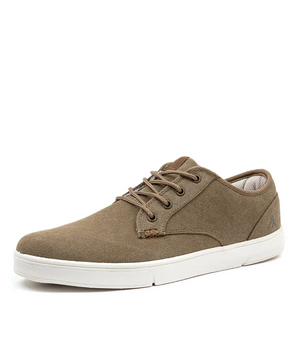 The Colorado Albatross Canvas Sneaker, shown from a side angle against a white background, features tan canvas material, brown laces, a white rubber sole, and a wide fit design.