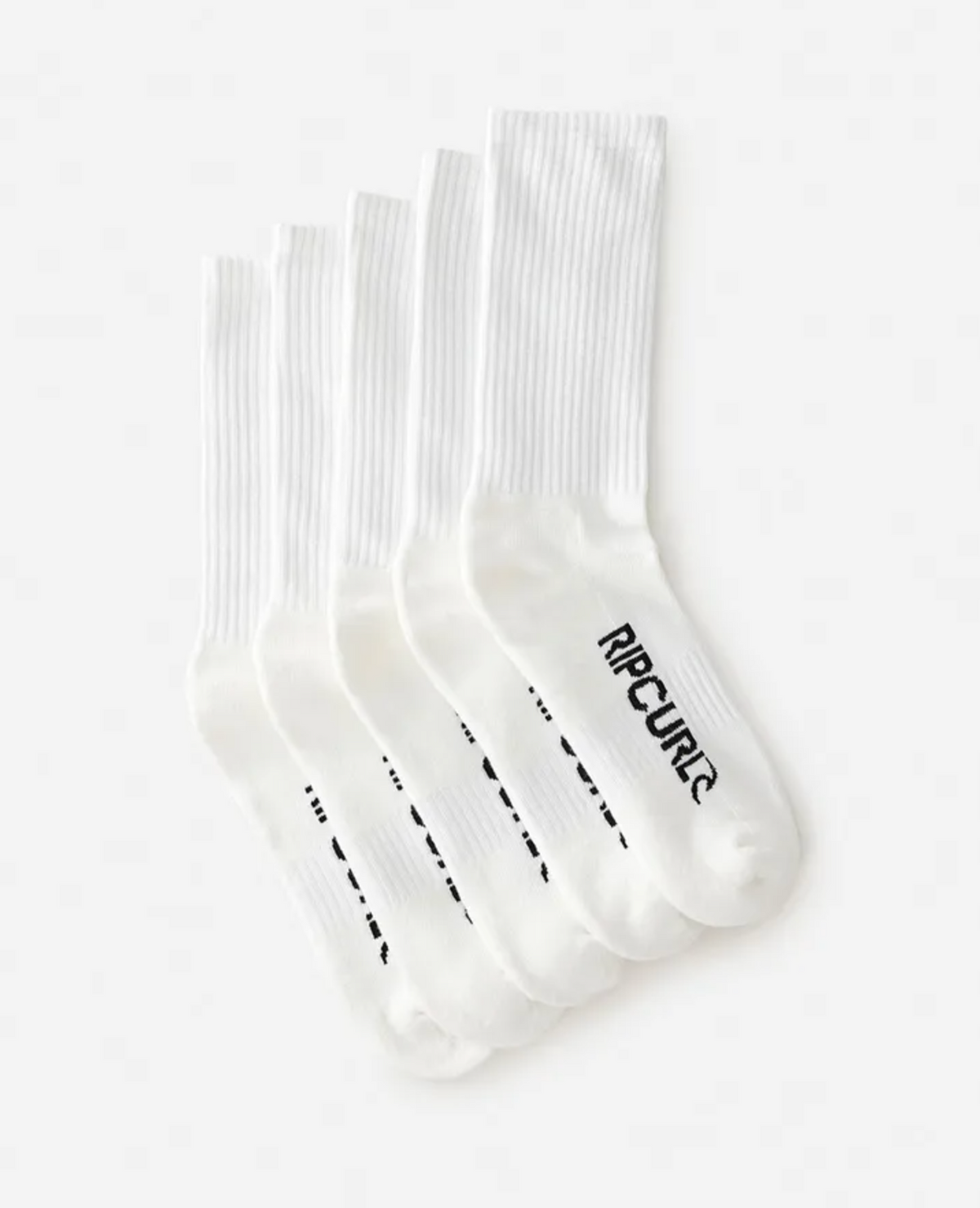 The Rip Curl School Crew Sock 5 Pack features five pairs of white crew socks with black "RIP CURL" logos on the sole and a terry footbed for comfort, displayed neatly stacked against a plain white background.