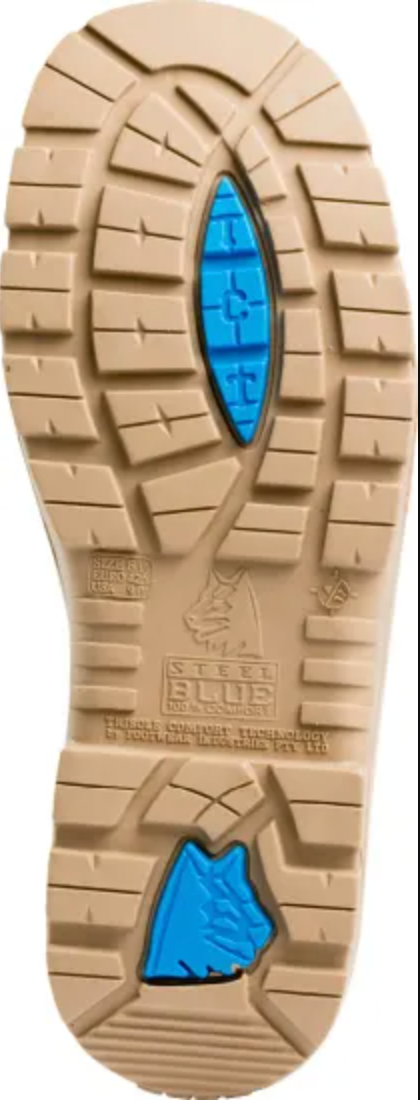 The Steel Blue Argyle Zip Scuff Cap Boot features a tan rubber sole with deep rectangular and triangular treads, blue sections under the heel and arch, embossed text, a small boot icon, and a heat-resistant TPU outsole.