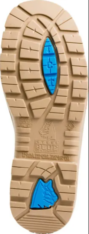 The Steel Blue Argyle Zip Scuff Cap Boot features a tan rubber sole with deep rectangular and triangular treads, blue sections under the heel and arch, embossed text, a small boot icon, and a heat-resistant TPU outsole.