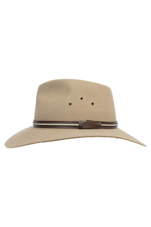 The Sovereign Cattleman is a wide-brimmed tan hat featuring vent holes on the crown and a sleek, decorative leather hat band around the base.