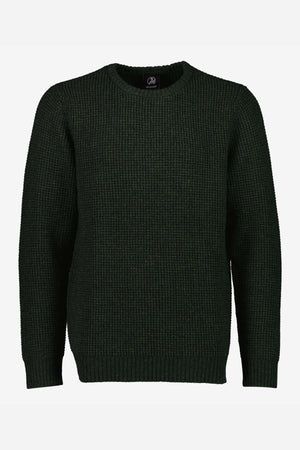The Swanndri Fistral Waffle Knit, a dark green, long-sleeve sweater with a crew neckline, is displayed against a plain white background. This cozy knit sweater features a textured waffle pattern and ribbing at the cuffs, hem, and collar.