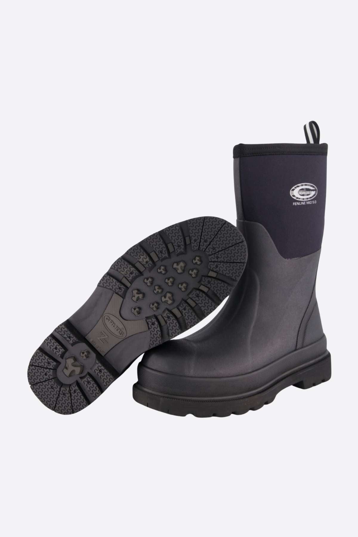 Grubs Fenline Mid Work Boot featuring thick black rubber soles and an ankle-high design. One boot is upright while the other lies on its side, displaying a tread pattern for superior grip. A logo is visible on the upright boot's side, ensuring maximum safety in every step.