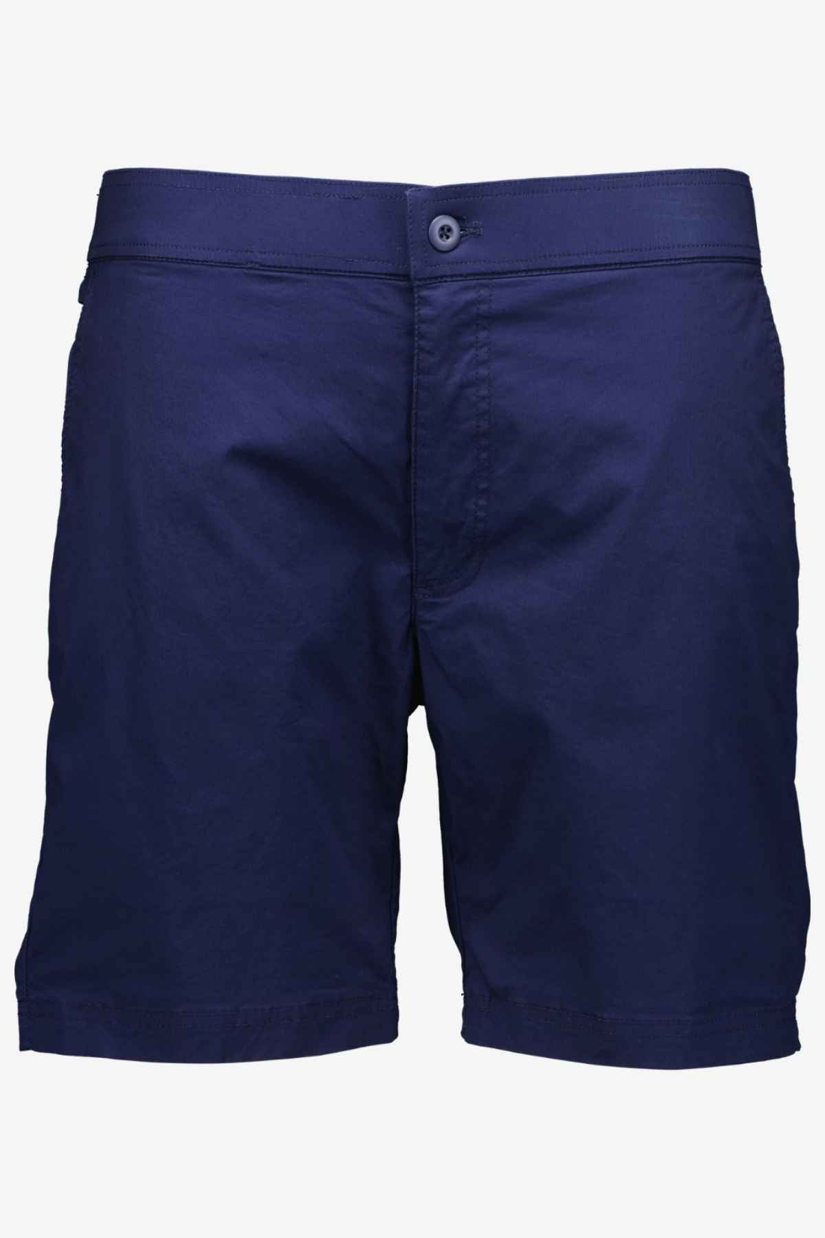 The Swanndri Sandy Point Short in navy blue highlights a comfortable cotton stretch fabric with a button and zip closure, accompanied by multiple front pockets. Its straight cut design is expertly displayed on a crisp white background.