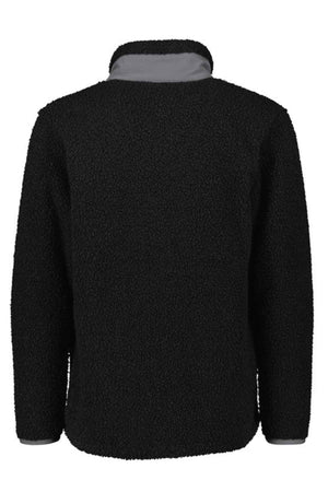 The Syzmik Streetworx Full Zip Sherpa Fleece is a black jacket with a fuzzy texture, long sleeves, and a gray inner collar. Shown from the back, it features a clean look with no visible logos or designs.